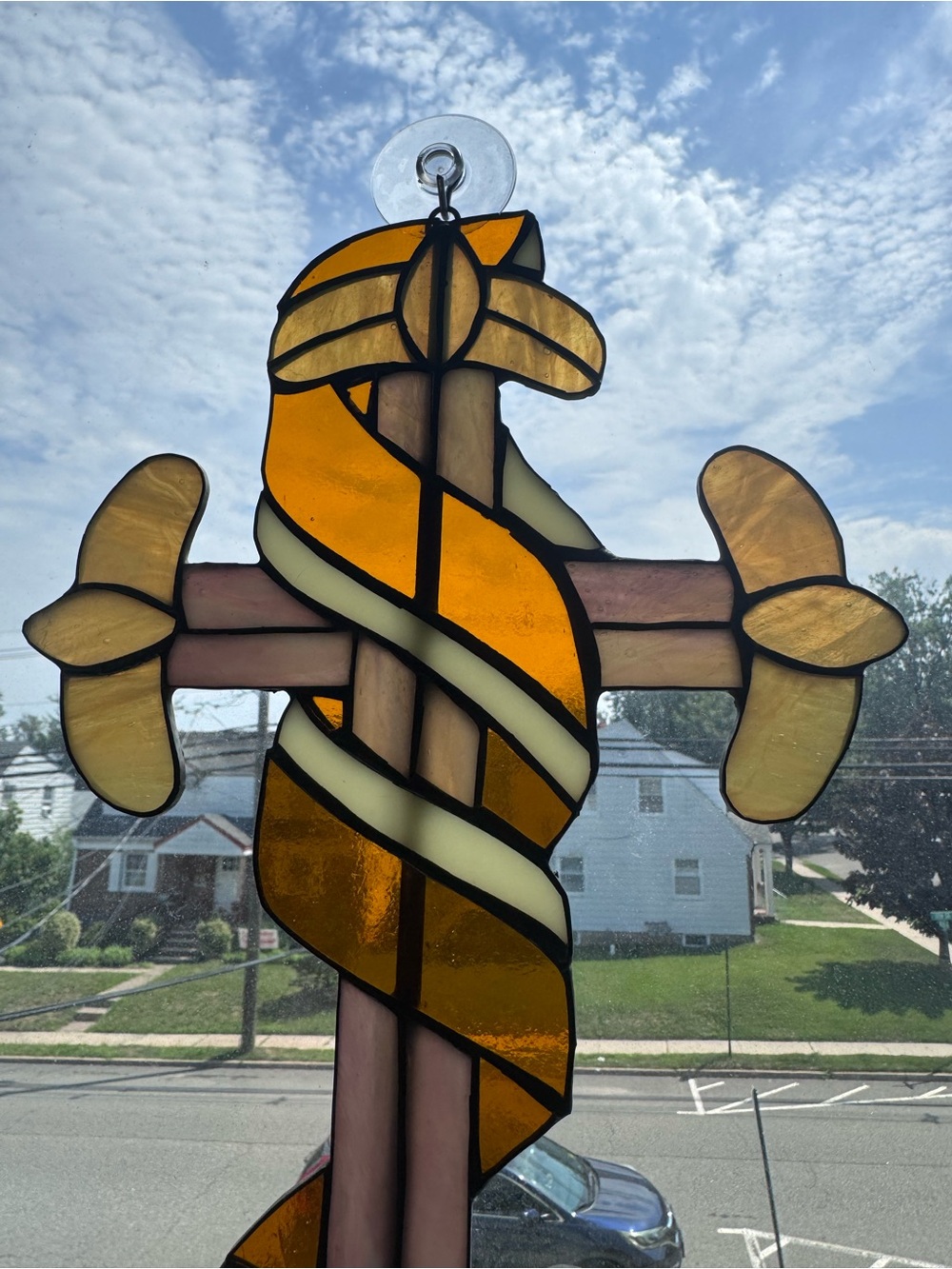 Large hand made stained glass cross with ribbon
